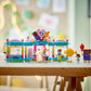 The LEGO® Friends Heartlake City Candy Store by Legos - Toyhouse features a colorful storefront, fun minifigures, and accessories—perfect for imaginative pretend play on any tabletop.
