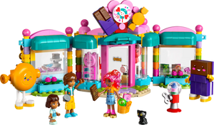The LEGO® Friends Heartlake City Candy Store by Legos - Toyhouse includes three figures, a cat, candy and chocolate mascots, and candy accessories for colorful pretend play.