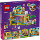 The back of the LEGO® Friends Pet Accessories Shop box by Legos - Toyhouse displays a vibrant pet shop and animal shelter, mini-dolls, pet figures, play features, and detailed animal-care scenes set against a purple background.