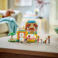 The LEGO® Friends Pet Accessories Shop by Legos - Toyhouse features a colorful animal-themed shop, perfect for animal-care pretend play, and includes three mini-figures plus several small animal figures displayed on a wooden table.