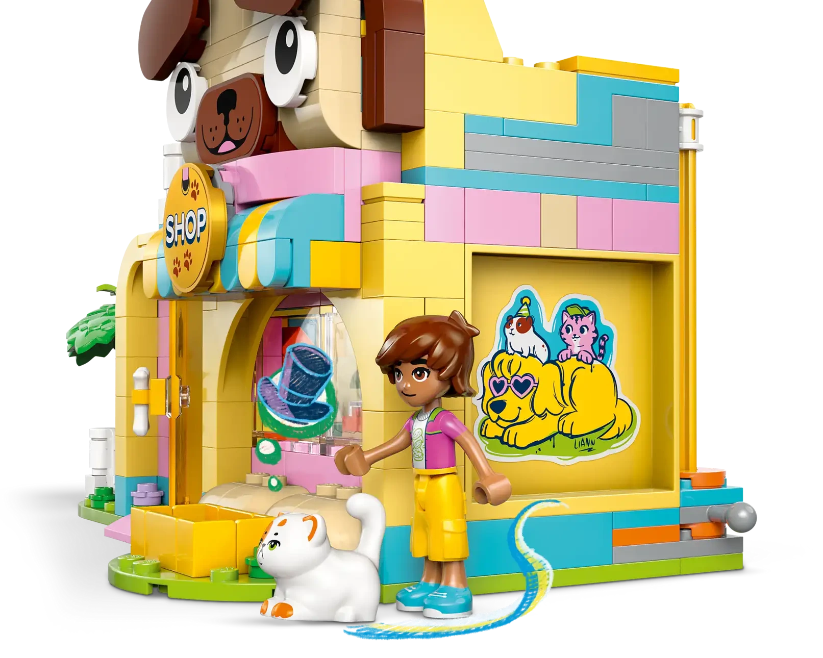 The LEGO® Friends Pet Accessories Shop by Legos - Toyhouse is a dog-face-shaped set with a girl figurine, a white cat, and colorful animal-care stickers for creative pretend play.