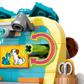 A close-up of the LEGO® Friends Pet Accessories Shop by Legos - Toyhouse shows a sticker with illustrated instructions, featuring a dog and green lever—highlighted by pink and yellow arrows—perfect for animal-care pretend play.