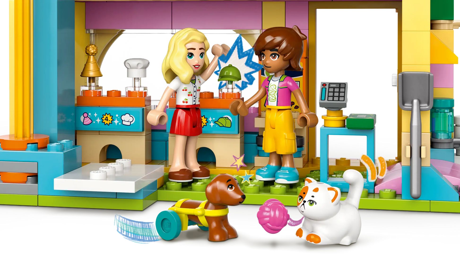 Two LEGO® Friends figures from the Legos - Toyhouse Pet Accessories Shop set enjoy animal-care pretend play with a dog, cat, playful accessories, and colorful furniture in the shop scene.