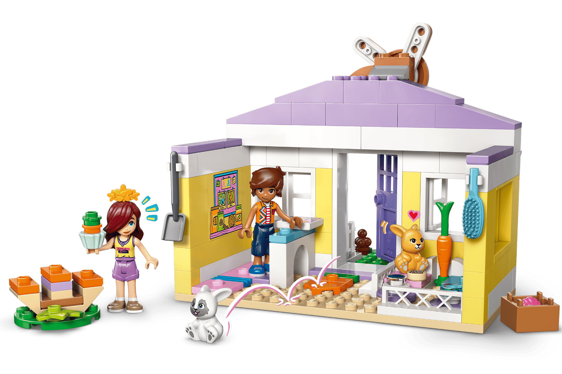 The LEGO® Friends Heartlake City Bunny Hotel by Legos - Toyhouse includes a small house, two figures, a dog, a rabbit, a carrot, and accessories—an ideal animal care toy and perfect gift for imaginative kids.