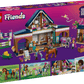 Box of LEGO® Friends Horse Stable and Riding Academy by Legos - Toyhouse, featuring horses, mini-dolls, and accessories in a stable scene—an ideal pretend play and horse lover gift—set on a purple background.