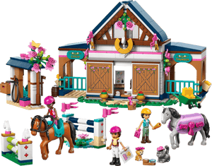 The LEGO® Friends Horse Stable and Riding Academy by Legos - Toyhouse features a stable, two horse toys, three mini-figures, jumps, accessories, and animal figures—ideal for creative riding academy adventures.