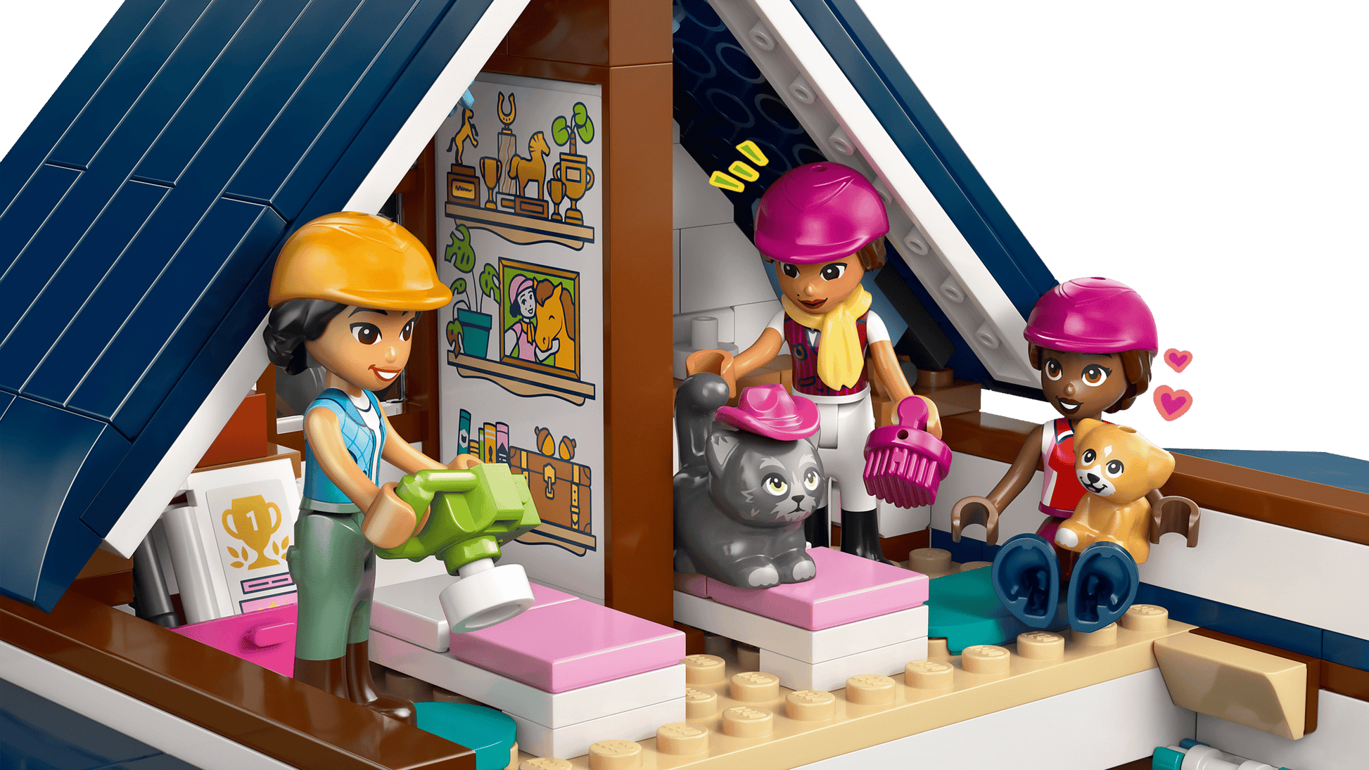 Three LEGO® figures with helmets enjoy pretend play with a gray cat and a tan dog inside a roofed Horse Stable—ideal for any horse lover or fan of the LEGO® Friends Horse Stable and Riding Academy by Legos - Toyhouse.