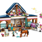LEGO® Friends Horse Stable and Riding Academy by Legos - Toyhouse includes a two-story stable, figures, horse toys, and accessories like a jump, wheelbarrow, tack, and flowers—perfect for endless riding adventures.