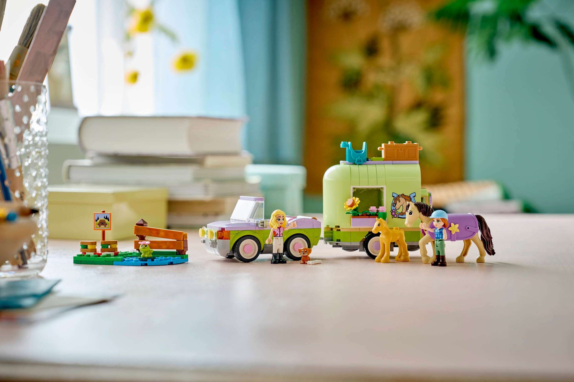 A must-have for horse lovers, the LEGO® Friends Horse & Baby Foal Trailer by Legos - Toyhouse features a car, trailer, two horses, two mini-dolls, a dog, and fun accessories—perfect for imaginative play.