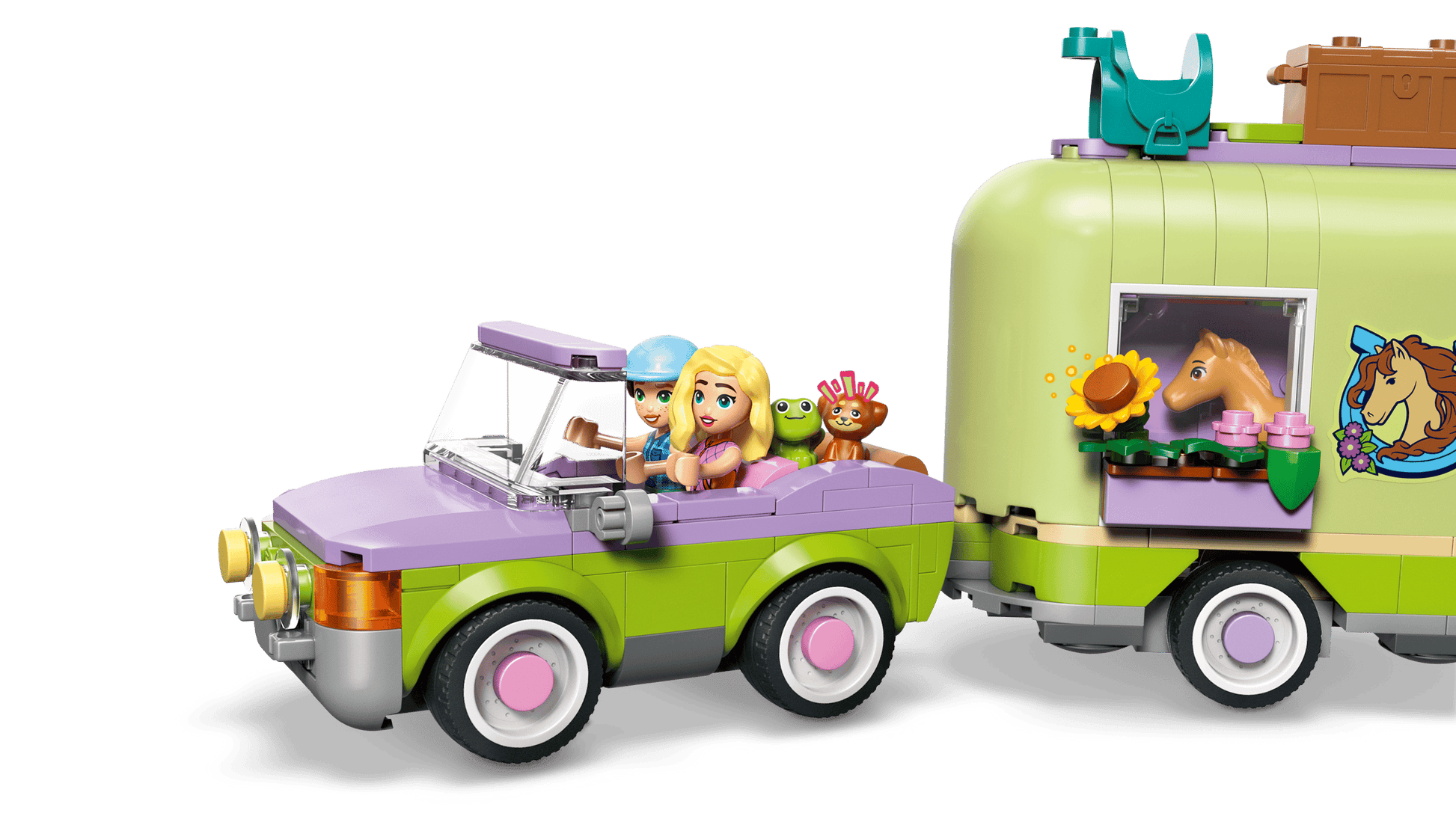 The Legos - Toyhouse LEGO® Friends Horse & Baby Foal Trailer includes a toy car, three figures, an animal, and a horse figure visible through the window—an ideal playset for horse lovers.