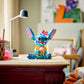 The LEGO® Disney™ Stitch set by Legos - Toyhouse features Stitch holding a flower and drink, making it a fun play-and-display gift for Disney fans—perfect for bright bedrooms or study spaces.