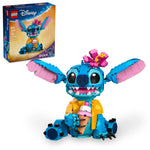 The LEGO® Disney™ Stitch set by Legos - Toyhouse features a blue and pink Stitch figure holding an ice cream, with the product box in the background—an adorable Disney gift for fans.