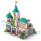 The LEGO® Disney™ Princess Castle & Royal Pets by Legos - Toyhouse features a vibrant castle with pink, teal, and gold accents, towers, windows, greenery, and a courtyard—ideal for magical adventures.