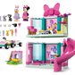 The LEGO® Disney™ Minnie's Pet Hotel by Legos - Toyhouse is a two-story playhouse with a pink slide, bow decor, mini-figures, car, and accessories—ideal for fans of Mickey Mouse Clubhouse building fun.