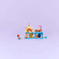 The LEGO® Disney™ Ariel's Magical Mini Palace by Legos - Toyhouse is a colorful, castle-like building toy for kids, featuring a red-haired mermaid figure and accessories, displayed on a plain light purple background.