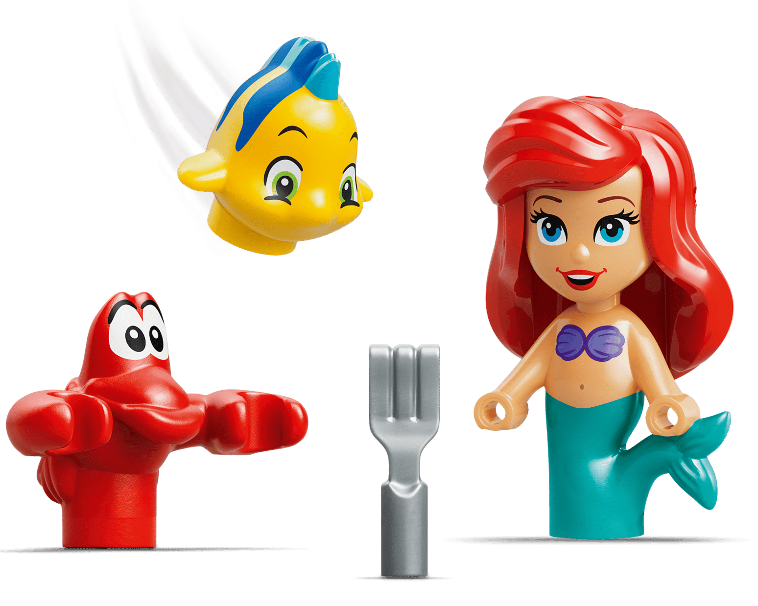Figures of a red crab, yellow fish, and Ariel with red hair and purple top are shown with a small gray fork in front, inspired by LEGO® Disney™ Ariel's Magical Mini Palace from Legos - Toyhouse.