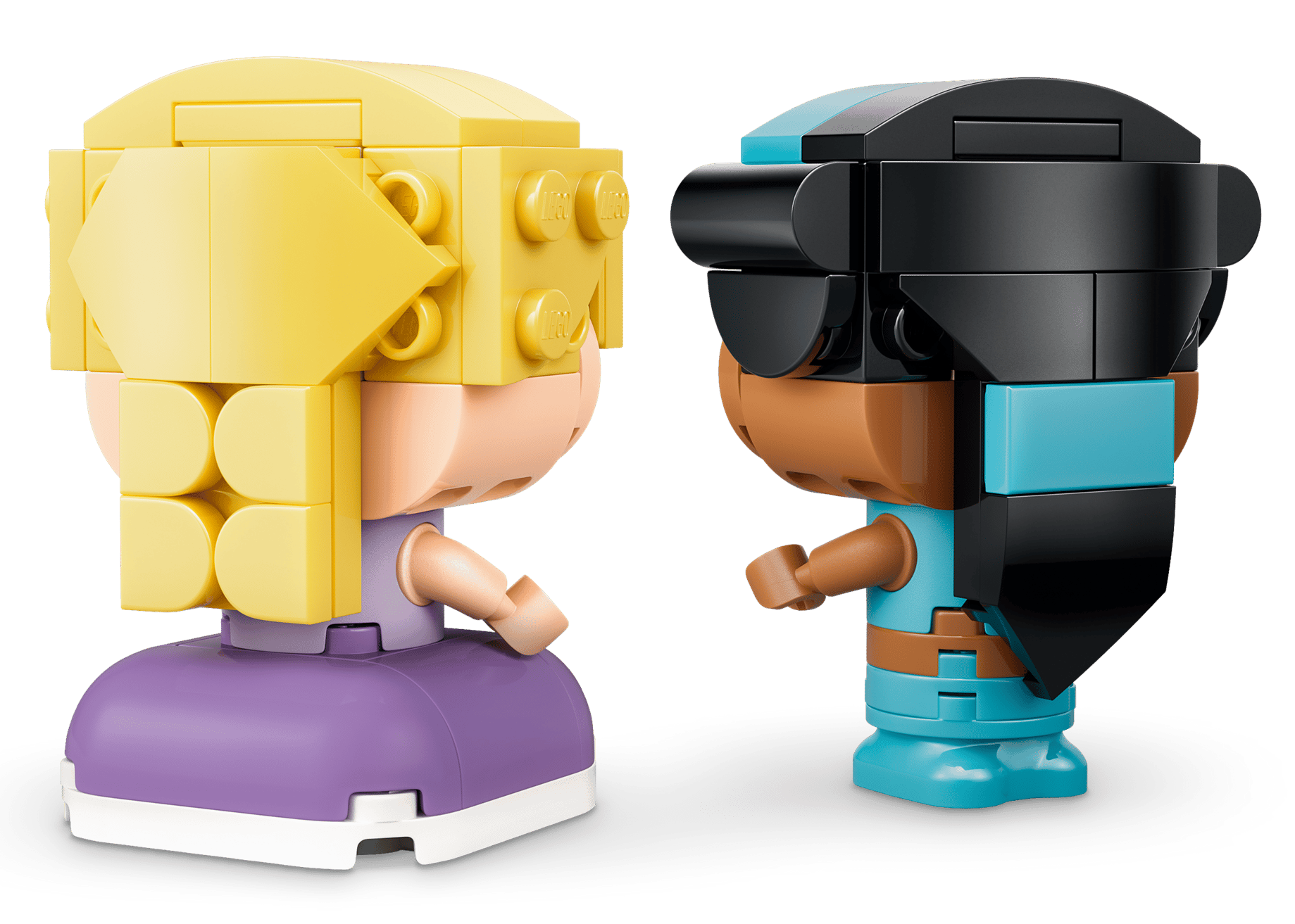 Two block-style figures face each other, one with yellow hair and a purple dress, the other with black hair, a blue headband, and blue outfit—perfect for any Legos - Toyhouse LEGO® Disney™ Mini Jasmine & Rapunzel playset.
