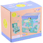A pastel-colored box with whimsical illustrations, labeled "Rainbow Woodland Jewelry Box" by Floss and Rock for ages 3+, is shown on the product packaging.