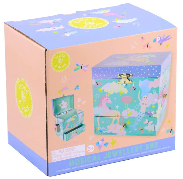 A pastel-colored box with whimsical illustrations, labeled "Rainbow Woodland Jewelry Box" by Floss and Rock for ages 3+, is shown on the product packaging.