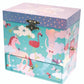 The Floss and Rock Rainbow Woodland Jewelry Box features a pastel design with unicorn, flamingo, stars, a drawer, front latch, and reveals a dancing mermaid each time you open this enchanting box.
