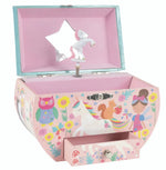 The Floss and Rock Rainbow Fairy Oval Shape Jewelry Box features pink unicorn-themed artwork, a small drawer, an open lid, and a spinning white unicorn figure that dances in front of a star-shaped mirror.
