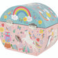 The Floss and Rock Rainbow Fairy Oval Shape Jewelry Box features whimsical artwork with rainbows, unicorns, an owl, flowers, butterflies, clouds, and strawberries. Includes metal clasps and a wind-up key.