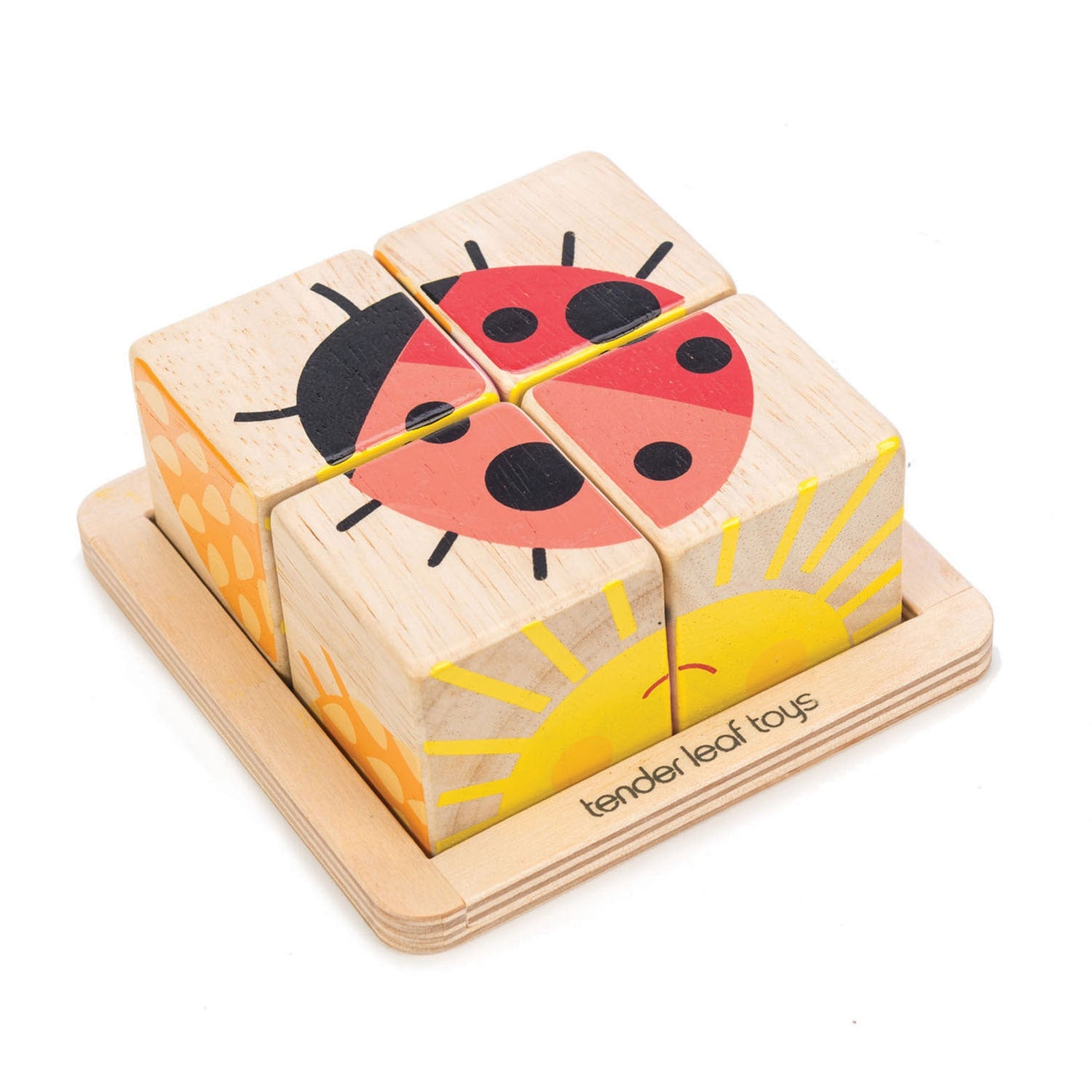 Four wooden blocks from the Tenderleaf Baby Blocks set fit together to display a ladybug and sunshine illustration. Branded with "Tender Leaf Toys" on the base, this charming animal block puzzle aids in developing hand-eye coordination, making it an ideal toddler toy.