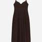 The CO Bustier Cut Dress is a sleeveless, black cotton poplin midi dress with thin straps and a fitted bodice, shown on a plain white background.
