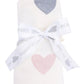 The Angel Dear Swaddle Blanket features a white, ribbed modal fabric with pink and gray heart prints, rolled up and tied with a ribbon. Soft and cozy, it's perfect for newborns.