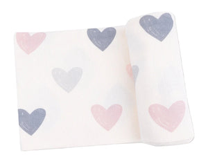 The Angel Dear Swaddle Blanket is a white ribbed modal swaddle with pink and gray heart patterns, shown partially rolled up.