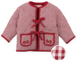 The Gingersnaps Baby Girls’ Lavinia Boxy Quilted Coat features a red and white gingham pattern with two front pockets adorned with cherry embroidery; a close-up inset highlights the textured fabric and playful bow-tie details that provide a charming finishing touch.