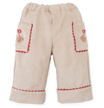 Gingersnaps Baby Girls’ Nellie Pant with Poodle Pocket features a comfy straight-leg design in beige, an elastic waistband, two front pockets with poodle face details and red trim, and cheerful red edging at the cuffs and pocket openings.