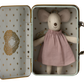 A Maileg Angel Mouse in Suitcase dressed in a pink dress inside a decorative, star-patterned metal suitcase, perfect for little ones.