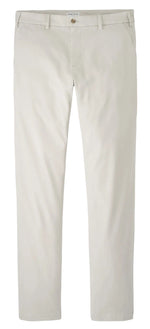 The Peter Millar Signature Sateen Flat Front Trouser is a light beige, straight-leg style made from cotton-stretch fabric with belt loops, side pockets, and button closure.