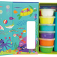 The Floss and Rock Clay & Play - Ocean set includes a vibrant underwater-themed box with six colors of air dry clay in stacked containers, plus two rolled-up sheets.