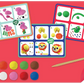 The Floss and Rock Clay & Play - Jungle set includes three instruction cards, colorful air dry clay pieces, and a wooden sculpting tool on a red surface—perfect for sparking creativity.