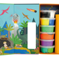 The Floss and Rock Clay & Play - Dinosaur set includes a dino-themed illustrated box with volcano, dinosaurs, trees, six colorful air dry clay containers, and a rolled-up orange sheet.