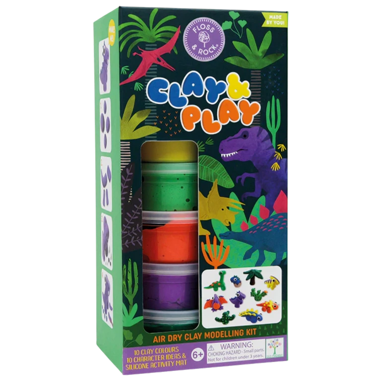 Floss and Rock’s Clay & Play - Dinosaur is a boxed air dry clay kit with 10 colors, character ideas, a silicone activity mat, and playful dinosaur-themed packaging with colorful illustrations.