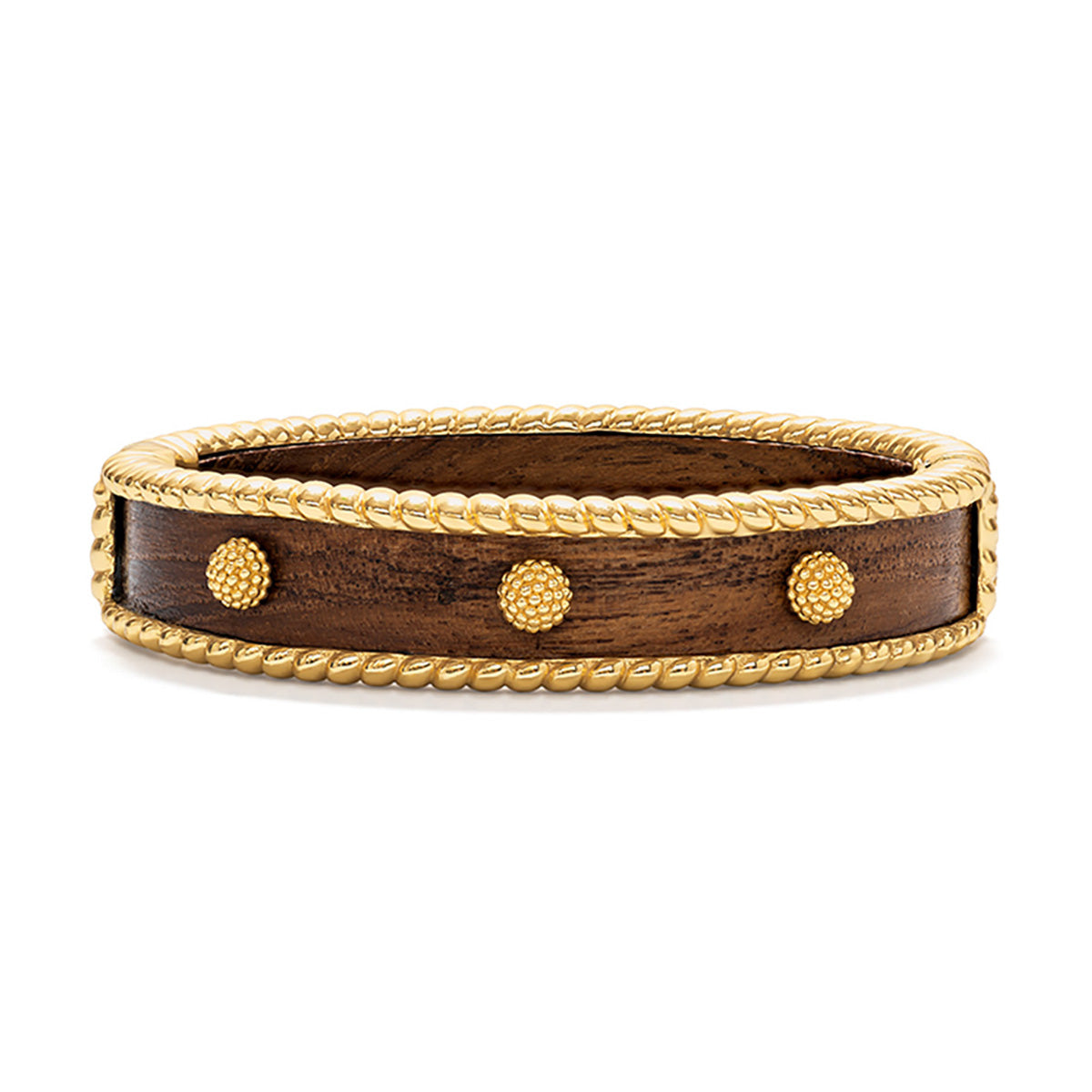 The Berry Small Hinged Bangle by Juliska Capucine De Wulf features a dark brown wooden band with gold-toned rope edges and three round gold studs on the front, making it perfect for stacking with your favorite golden jewelry.