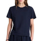 Model wearing TWP His Tee, an ultra-soft cotton crewneck in plain navy blue, shown from the upper body with arms relaxed at sides against a white background.