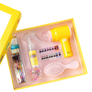 Check out the Hairstyle Hero Salon Kit by Super Smalls! This toy hairdressing set includes a yellow toy hairdryer, spray bottle, detangling brush, hairclips, colorful bands, and shiny foil extensions—everything your little stylist needs for creative fun!.