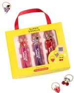 The Super Smalls Gloss it Fruity Lip Gloss Ring Set includes a trio of fruity lip glosses in pink, purple, and red tubes plus three colorful rings, shown both inside and outside the packaging.