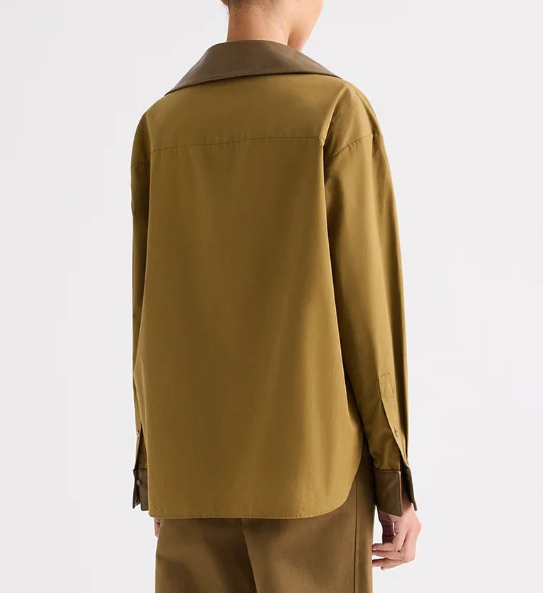 Rear view of the olive Kangaroo TWP A Case of You Shirt, featuring a long-sleeved cotton design with a contrasting brown collar and cuffs.