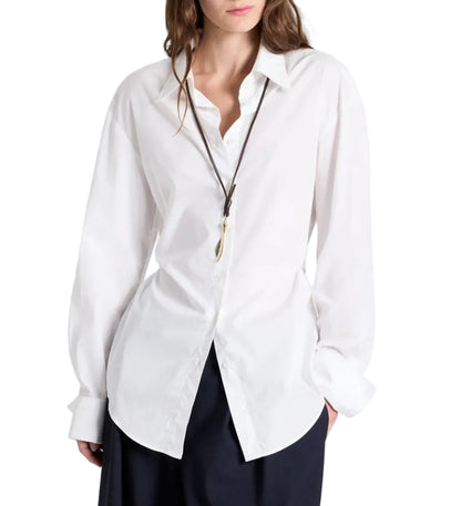 The Night We Met Shirt, a long-sleeved, superfine cotton button-down worn with a long pendant necklace.