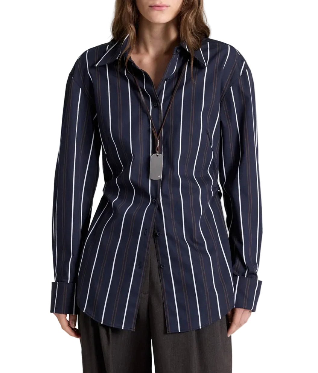 TWP The Night We Met Stripe Shirt in striped cotton with dark blue and white vertical stripes, worn with a silver rectangular pendant on a leather cord.
