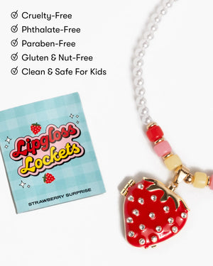 The Super Smalls Strawberry Surprise Lipgloss Locket kids necklace sits beside a “Lipgloss Lockets” card, with the strawberry lip gloss benefits shown in the top left to make beauty play even more fun.