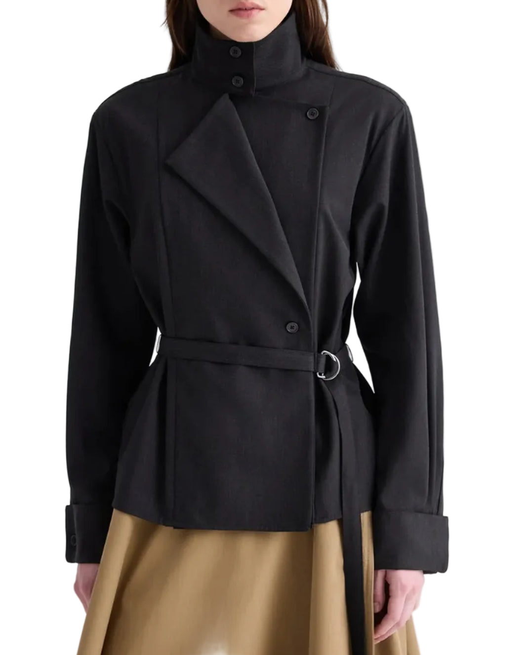TWP’s The Last Chapter Italian Wool Twill Jacket, featuring a black belted wrap design with high collar, lapels, and button details, styled over a tan skirt.