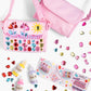 Two pink purses—one adorned with vibrant plastic gems and playful doodles—are surrounded by loose gems, gem glue, and an instruction sheet on a white background, showcasing the Super Smalls Preppy Purse Gemify™ Craft Kit: a delightful DIY gem purse set for creative fun.