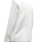 A person is shown from the back against a white background, wearing the TWP Perfect Boyfriend Blazer in white with matching trousers.