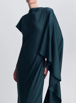 Simkhai Ora Satin Gown in dark teal featuring a high, draped neckline and a flowing cape silhouette.